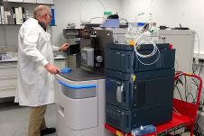 A person using the Synapt mass spectrometer